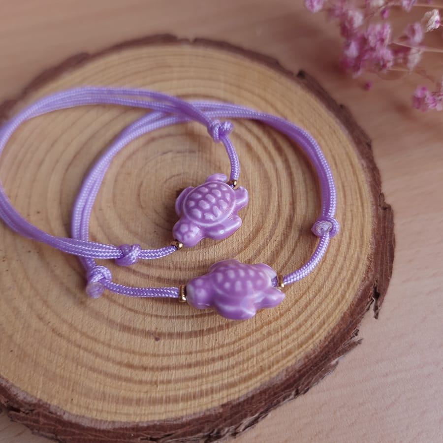 Pulsera personalizada tortuga modelo morado para bautizo o comunión